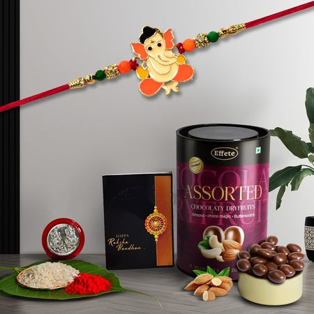Multicolor Orange Rakhi  Bracelet (K1_255_as)  Assorted Chocolate Dry Fruits 96gm With Silver Color Pooja Coin Roli Chawal  Greeting Card  Occasion  Rakhi For Brother With Gift  Handmade Rakhi Rakhi Combo For Brother  Stylish Rakhi