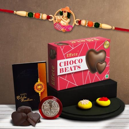 (K1_522_cb32) Multicolor Idol Ganesh Rakhi Combo With Chocolate Beats 32gm Silver Color Pooja Coin Roli Chawal  Greeting Card  Occasion  Rakhi For Brother With Gift  Bracelets For Men Stylish Rakhi Combo For Brother  Set Of 1 Rakhi