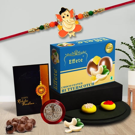 (K1_255_bs32) Multicolor Orange Rakhi  Bracelet With Chocolate Butter Scotch 32gm Silver Color Pooja Coin Roli Chawal  Greeting Card Rakhi For Brother With Gift  Handmade Rakhi Rakhi Combo For Brother  Stylish Rakhi For Brother  Set