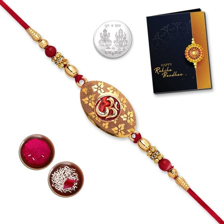 Multicolor Golden Oval Shaped Rakhi  Bracelet (K1_295) With Silver Color Pooja Coin Tilak Set  Greeting Card  Chandi Ki Rakhi  Rakhi Wishes Greeting Card  Fancy Rakhi For Brother  Rakhi Cards  Silver Rakhi  Rakhi Design  Online Rakhi Comb