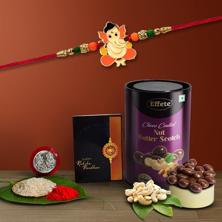 (K1_255_bs) Multicolor Orange Rakhi Combo With Chocolate Butter Scotch 96gm Silver Color Pooja Coin Roli Chawal  Greeting Card  Occasion  Rakhi For Brother With Gift  Bracelets For Men Stylish Rakhi Combo For Brother  Set Of 1 Rakhi